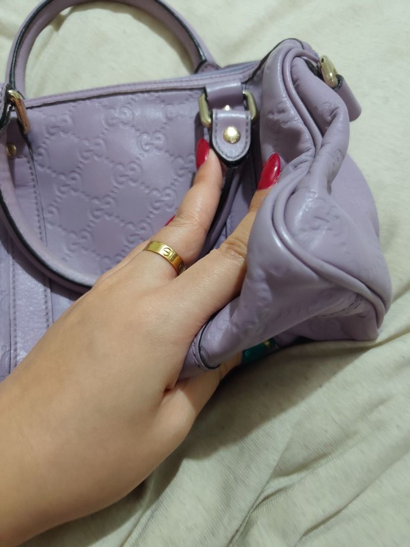 Gucci guccissima Embossed Leather Handbag (Category: Luxury Bags & Wallets) located in Caloocan City. Submitted by refreshmycloset444 (Listing ID 1460387901, Image 3). Description: - Light purple Gucci handbag - Genuine leather with embossed GG pattern - Elegant gold hardware details - Comfortable top handles for carrying - Secure zipper closure - Timeless and classic Gucci design Original Guccissima genuine leather small speedy.