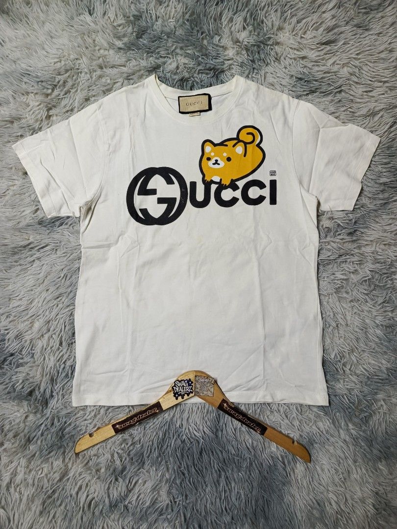 Gucci Fusion T-shirt (Category: Tshirts & Polo Shirts ) located in Manila. Submitted by swag_dealer (Listing ID 1460433711, Image 1). Description: Gucci Fusion T-shirt size XS on tag Length: 27 Width: 20.5 No issue💯 Complete tags and washtags 500+sf.