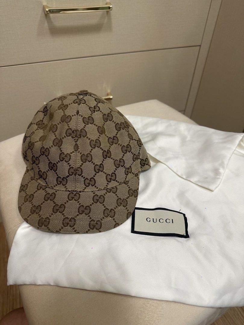 Gucci GG Monogram Baseball Cap for kids/teens (Category: Caps & Hats) located in Quezon City. Submitted by jennbustillos (Listing ID 1460459369, Image 2). Description: - Authentic Gucci Cap - Classic GG Monogram Canvas - Iconic Red and Green Stripe Detail (inside) - Size: M (54cm) - Comes with Gucci Dust Bag - Ideal for Everyday Wear.