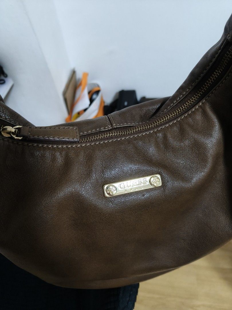 Guess Genuine Leather Shoulder bag (Category: Shoulder Bags) located in Las Pinas. Submitted by lm1205 (Listing ID 1460366909, Image 3). Description: • 💯% authentic and genuine leather • No scratches • Medium size • Soft leather. sobrang ok pa leather ng guess before compared ngayon.