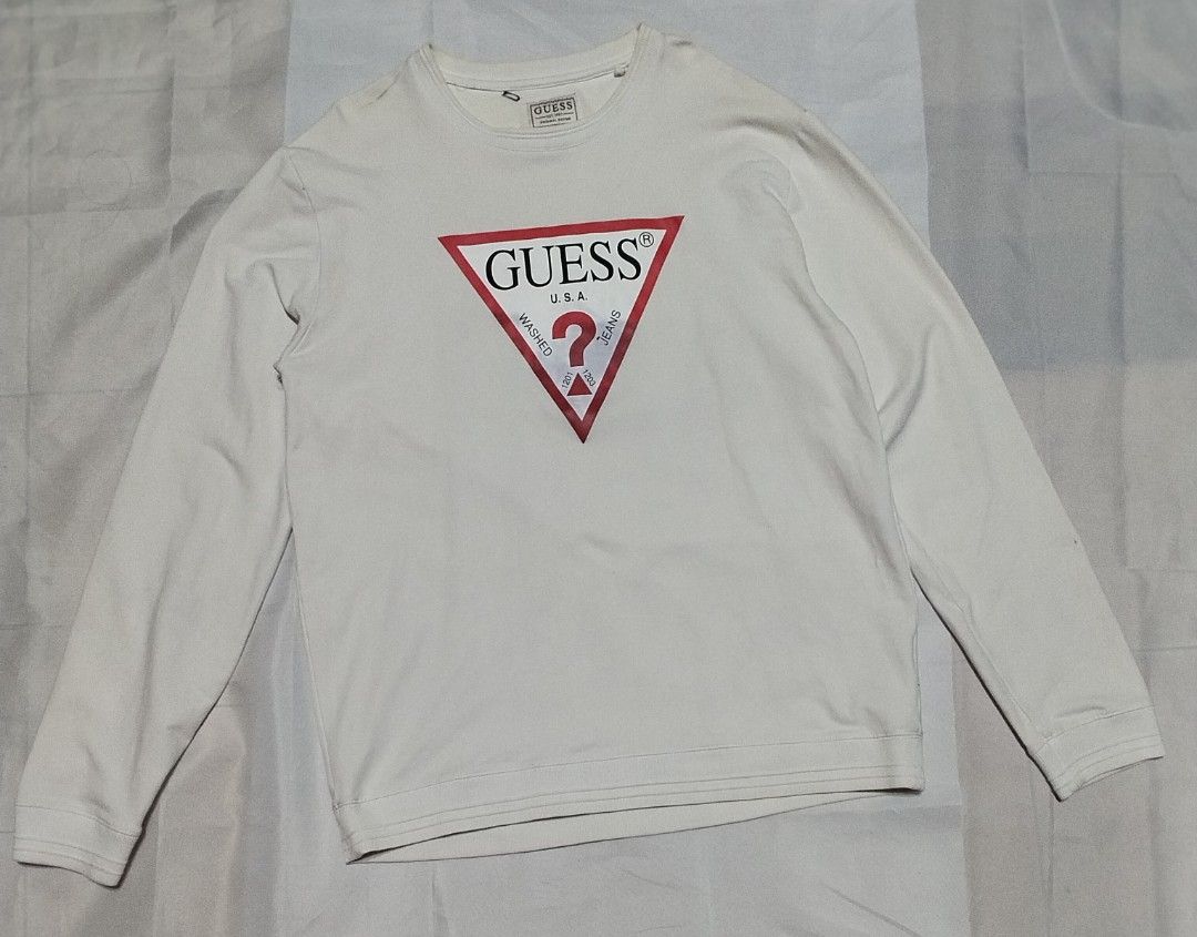 GUESS LONGSLEEVE (Category: Tshirts & Polo Shirts ) located in Batangas. Submitted by streetheadph (Listing ID 1460378032, Image 1). Description: GUESS LONGSLEEVE SIZE ON TAG : XL DIMES: W 21 / L 28.5 CONDITION: VERY CONDITION COLOR: WHITE COLORRATE: 9.3 / 10 ISSUE: NEED BABAD NAY PART NA MAY YELLOW PERO MAALIS SA BABAD ( see picture ) PRICE: 600+ SHIPPING FEE NEED WASH THIS ITEM IS UKAY PLEASE MANAGE YOUR EXPECTATION ALWAYS READ THE DETAILS.