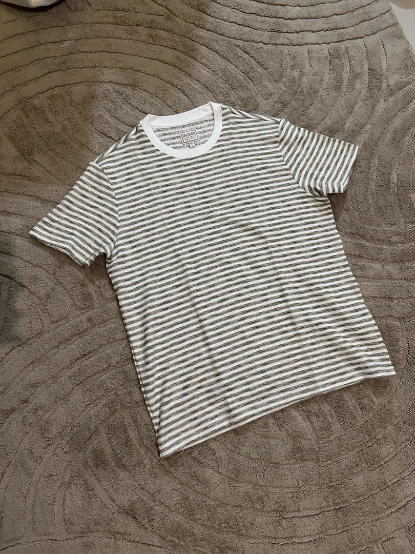 Guess Striped T-Shirt (Category: Tshirts & Polo Shirts ) located in Quezon City. Submitted by kayqmb (Listing ID 1460473414, Image 1). Description: - original design t-shirt - classic horizontal stripes in green and white - made from a comfortable polyester blend - no issues.