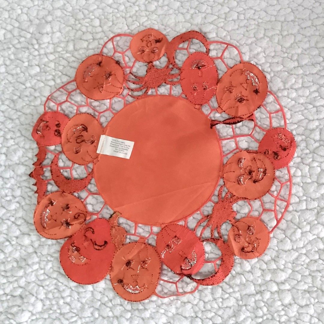 Halloween Happy Jack-O-Lanterns Doily (Category: Table Linen & Textiles) located in Tuguegarao City. Submitted by thriftedtreasures101.1 (Listing ID 1460504425, Image 2). Description: Embroidered table decoration featuring a detailed cutwork spiderweb design lined with various friendly jack-o'-lanterns, spiders and crescent moons. Slightly used, in very good condition. Color may vary due to lighting. ‎ ‎📍 Location: Cagayan Valley ‎👛 MOP: Maya/G