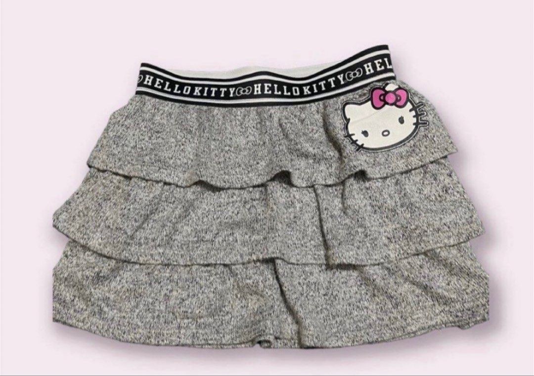 Hello Kitty Gray Tiered Skirt 8yo (Category: Babies & Kids Fashion) located in Rizal. Submitted by cassappl (Listing ID 1460444503, Image 1). Description: - Cute grey tiered skirt - Features a Kitty patch on the side - " Kitty" branded elastic waistband - Marled fabric texture - Easy pull-on style - Great for casual wear or Kitty enthusiasts.