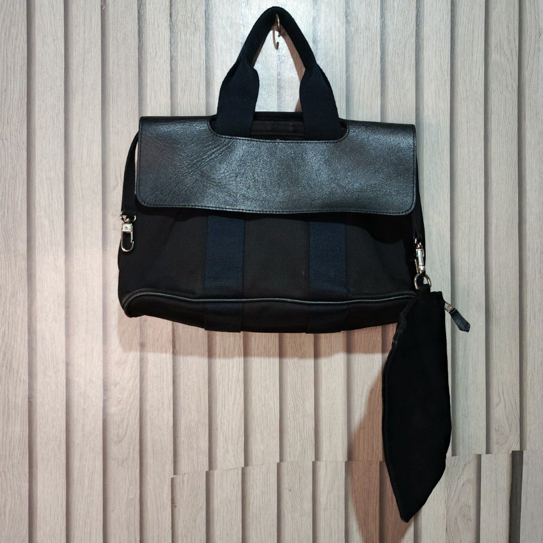 Hermes Black Canvas Leather Trim Tote Bag Pouch (Category: Luxury Bags & Wallets) located in Manila. Submitted by gbryanrave27905 (Listing ID 1460353045, Image 1). Description: HERMES TOIL SWIFT VALPARAISO BAG 📌 Elegant leather trim 📌 Comes with a matching pouch 📌 Authentic Hermes Paris logo on a metal button 📌 Two comfortable top handles 📌 Includes a detachable shoulder strap for versatility 📌 Ideal for everyday use or travel adventures 📌