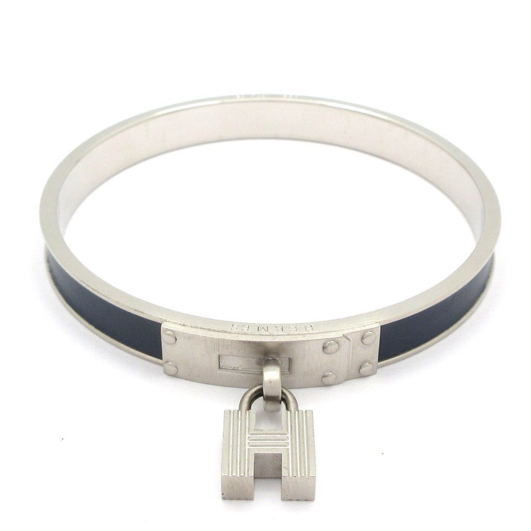 Hermes Excellent condition bangle, Kelly bangle, leather, silver x navy. (Category: Jewelry) located in Las Pinas. Submitted by daisuki_japan_luxury_by_reiko (Listing ID 1460308405, Image 1). Description: Notes [Main Unit] - Main Unit ⇒ Scratches / Dullness / Discoloration brand HERMES Genre Bangle Product Name Kelly Bangle Actual size Wrist circumference: approx. 19 cm, Width: approx. 0.8 cm Size Guide color Silver x Navy material Metal material