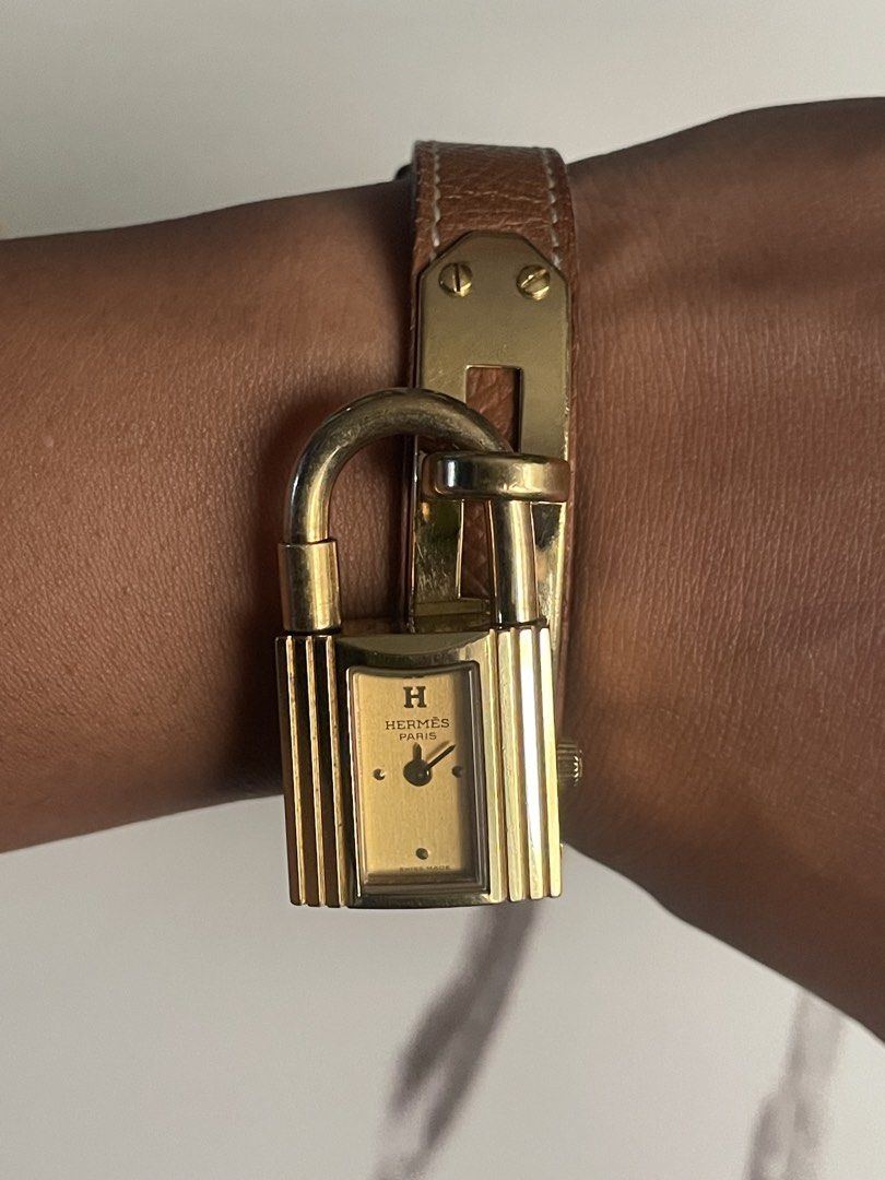 Hermes Paris "Kelly" Lock Watch (Category: Women's Watches) located in Taguig. Submitted by j_watches007 (Listing ID 1460318397, Image 1). Description: Authentic Secondhand ⌚ Hermes Paris Watch Swiss Made Quartz Serial Number: 796857 Plaque: 6 10 M Elegant Gold Tone Case with Lock Design Classic Brown Leather Strap Authentic Secondhand ⌚ “Watch Only” DISCLAIMER: IT’S OLD USED WATCHES EXPECT SOME SCRATCHES, SIGNS OF USED & PLEASE MANAGE YOUR EXPEC