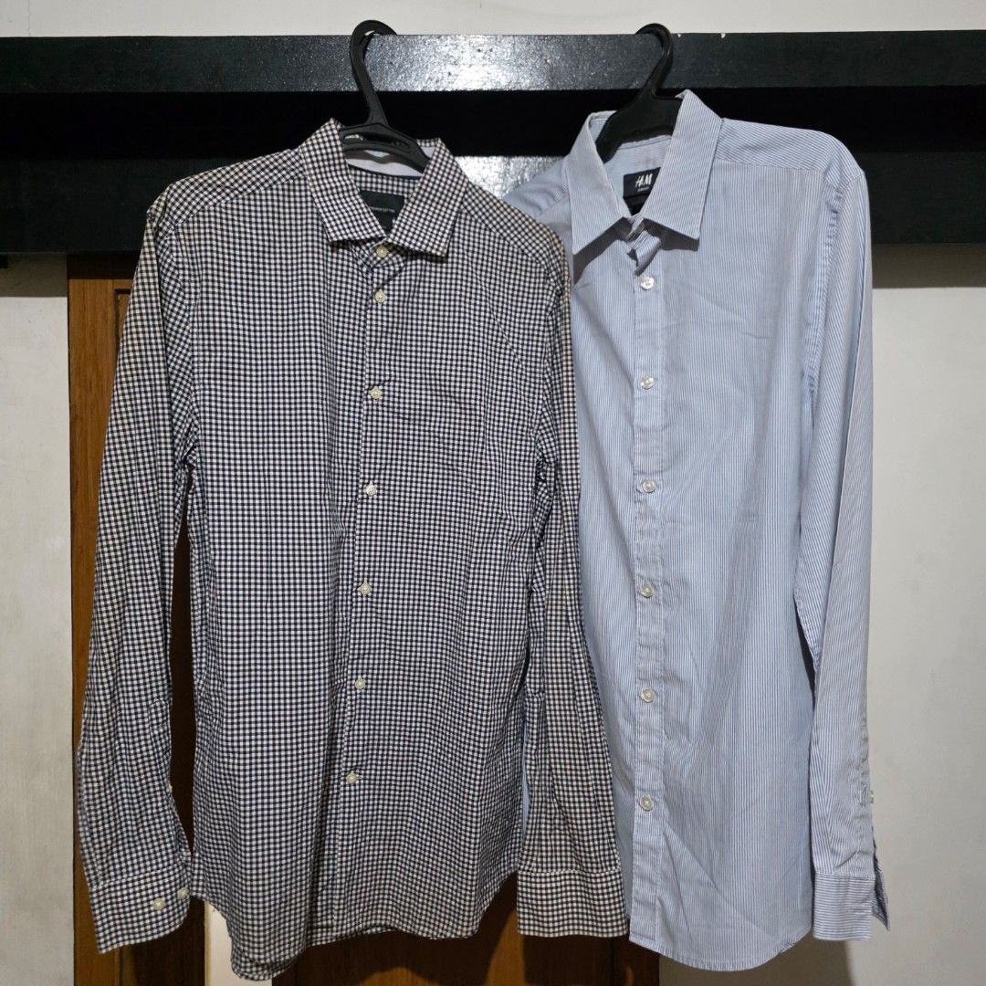 H&M Slim Fit Men's Shirts (2 pcs) (Category: Tshirts & Polo Shirts ) located in Manila. Submitted by etc.06 (Listing ID 1460404502, Image 1). Description: - Two H&M long-sleeved button-down shirts - Style 1: Light blue with thin pinstripes - Style 2: Black and white gingham check - Slim fit design - Versatile for casual and smart casual occasions - Great value when buying both shirts.