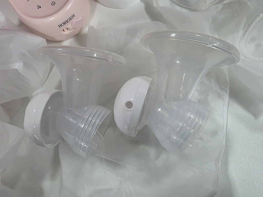 HORIGEN WONDERMORE BREASTPUMP (Category: Breastfeeding & Bottle Feeding) located in Manila. Submitted by yammm23 (Listing ID 1460368992, Image 2). Description: HORIGEN WONDERMORE In very good condition. First Owner. Looksnew since twice ko lang nagamit. Complete inclusions with box and free 17mm flange size. Unused 21mm and 25mm flange size. No issue and di ko pa natanggal ung plastic ng motor. Makinis pa and ready to use. PM for any inquiry. Loc