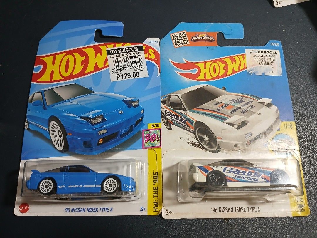 Hot Wheels '96 Nissan 180SX Type X (2 variations) (Category: Vehicle & Diecast Models) located in Manila. Submitted by _mugen24 (Listing ID 1460406961, Image 1). Description: - Set of 2 Hot Wheels '96 Nissan 180SX Type X - Colors: 1 Blue, 1 White with racing stripes - From the HW: The '90s series - Ideal for collectors and JDM car enthusiasts - Both cars are sealed in original packaging - Selling as set only Can be delivered by Lalamove, Grab or 