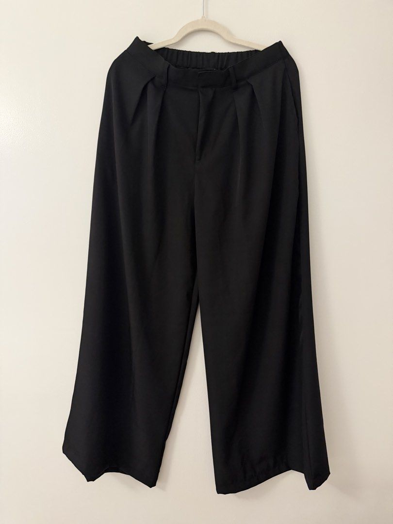 HTP Wide Leg Pants Black XL (Category: Other Bottoms) located in Makati City. Submitted by isadeclutters (Listing ID 1460506346, Image 1). Description: - Brand: HTP - Color: Black - Style: Wide Leg Pants, loose, flowy - XL on tag, best fit L - Features: Elastic waistband, pleated front detail - Occasion: Casual or smart casual wear Office pants.