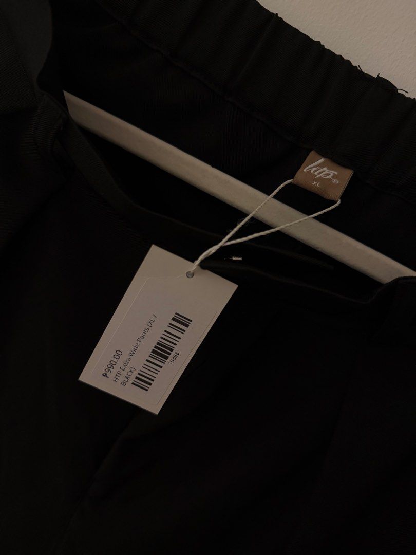 HTP Wide Leg Pants Black XL (Category: Other Bottoms) located in Makati City. Submitted by isadeclutters (Listing ID 1460506346, Image 3). Description: - Brand: HTP - Color: Black - Style: Wide Leg Pants, loose, flowy - XL on tag, best fit L - Features: Elastic waistband, pleated front detail - Occasion: Casual or smart casual wear Office pants.