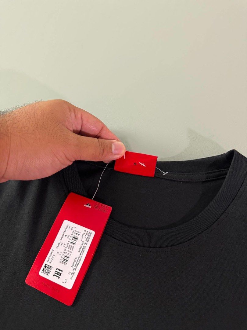 HUGO BOSS (Category: Tshirts & Polo Shirts ) located in Guagua. Submitted by sweetboyy (Listing ID 1460407756, Image 2). Description: HUGO BOSS EXCELLENT CONDITION / NO ISSUE SIZE MEDIUM ON TAG / DIMES L28 W21.