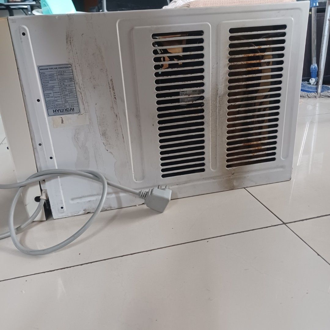 Hyundai Window Air Conditioner (Category: Air Conditioning and Heating) located in Las Pinas. Submitted by ehiledavidmalan (Listing ID 1460329069, Image 3). Description: - White Hyundai window air conditioner - 1HP Energy efficient (930 W) - Features temperature, fan speed, and mode controls - still in good condition - Power cord included -remote available .