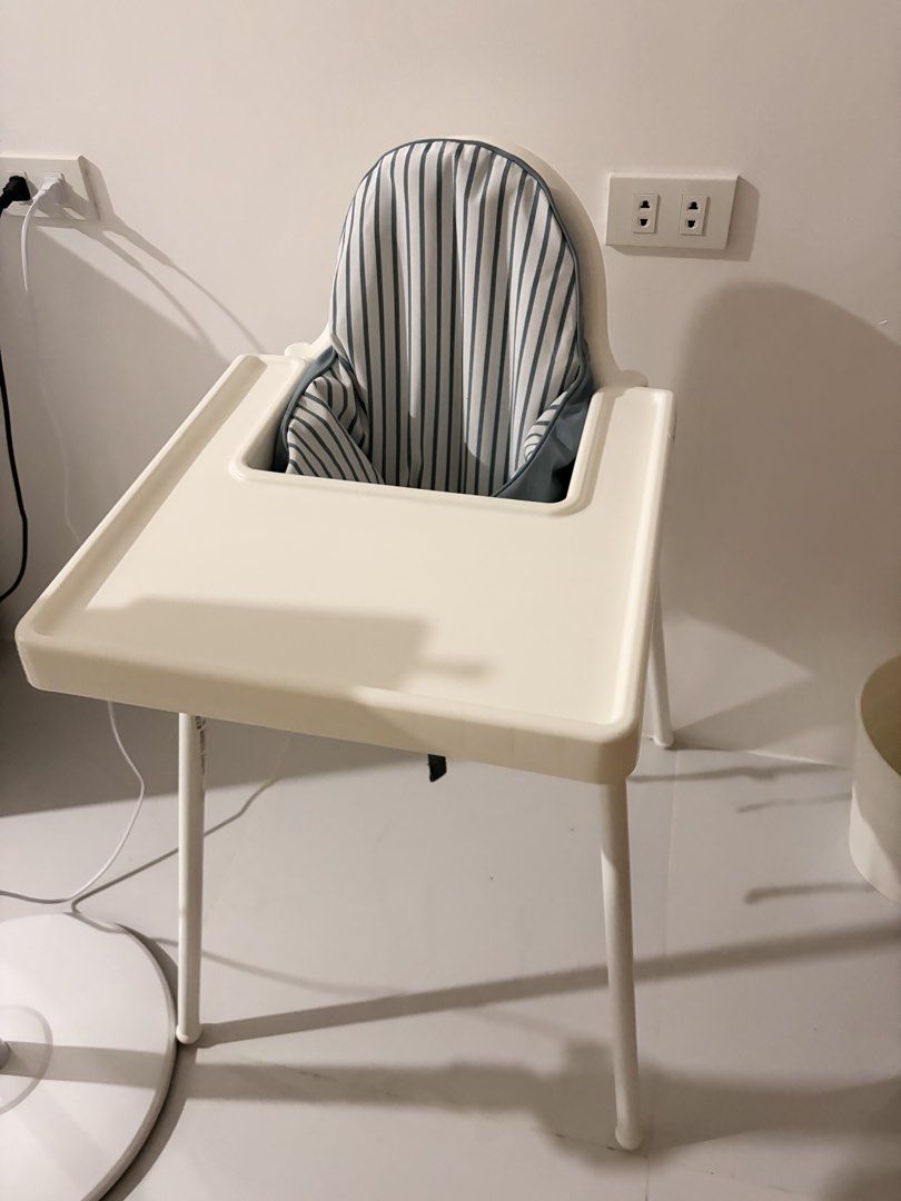 IKEA High Chair with Cushion (Category: Baby High Chairs) located in Manila. Submitted by aubreyours07 (Listing ID 1460457052, Image 1). Description: - IKEA high chair - Comfy striped cushion included - Easy-to-clean tray - Sturdy white legs - Ideal for meal times - Ready for its new home.