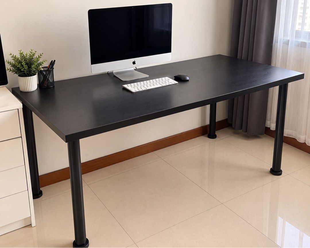 IKEA STUDY WORK TABLE (Category: Tables & Sets) located in Singapore. Submitted by lustbones (Listing ID 1460398755, Image 3). Description: IKEA Black Tables / Desks – 3 Available, Different Sizes Selling 3 IKEA black tables, all in similar simple minimalist style but in 3 different sizes. Great for use as a study desk, computer desk, work table, gaming setup or general-purpose table. * 3 tables available * 3 different sizes – choose according to