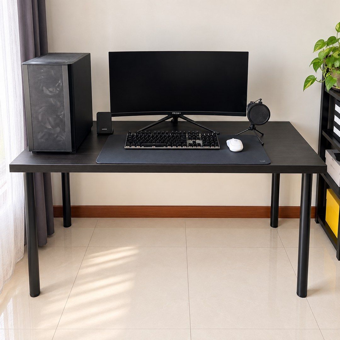IKEA STUDY WORK TABLE (Category: Tables & Sets) located in Singapore. Submitted by lustbones (Listing ID 1460398755, Image 1). Description: IKEA Black Tables / Desks – 3 Available, Different Sizes Selling 3 IKEA black tables, all in similar simple minimalist style but in 3 different sizes. Great for use as a study desk, computer desk, work table, gaming setup or general-purpose table. * 3 tables available * 3 different sizes – choose according to