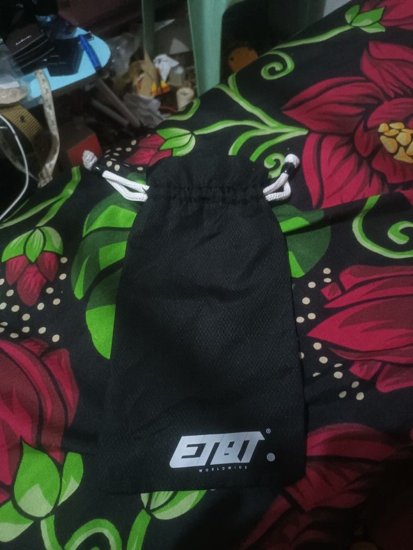 Imported ETBT Worldwide Drawstring Pouch — Black Logo Bag (Category: Purses & Pouches) located in San Juan, La Union. Submitted by declutteringog7 (Listing ID 1460398786, Image 1). Description: This is an ETBT Worldwide branded black drawstring pouch — likely originally for eyewear, accessories, or small gadgets. Clean, simple, and branded. 📝 Listing Title: 🇺🇸 Imported ETBT Worldwide Drawstring Pouch — Black Logo Bag Price: ₱150– ₱250 Descript