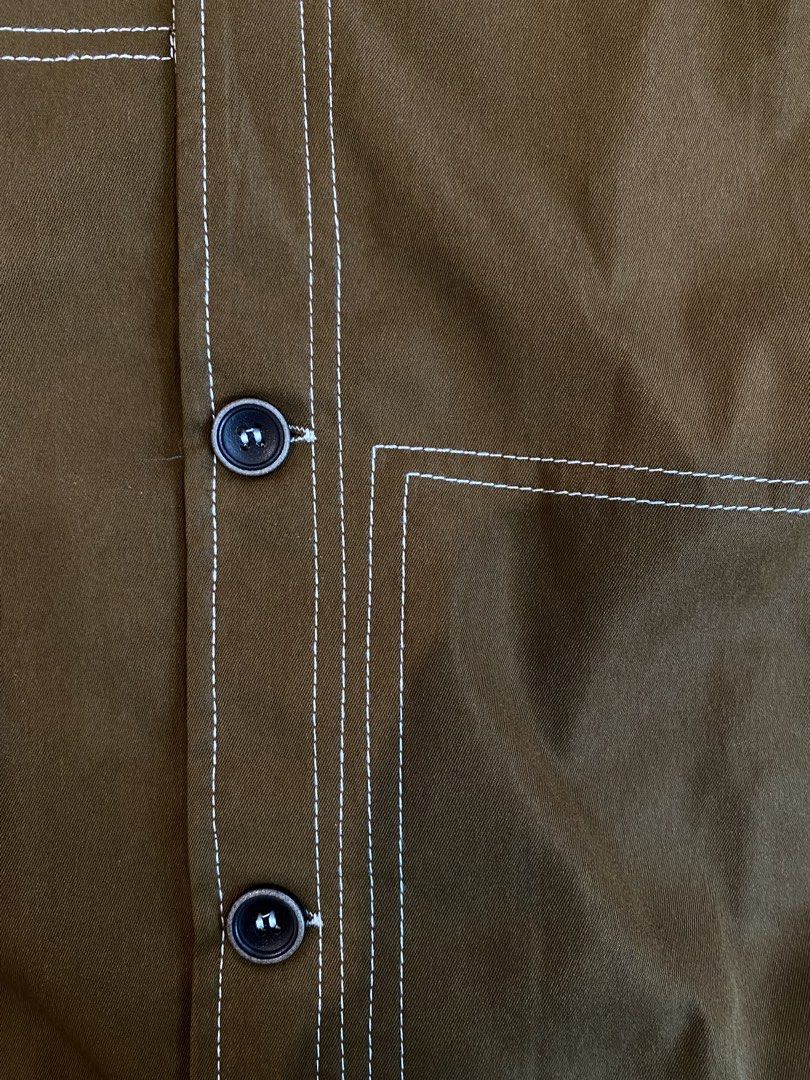 INCERUN Brown Jacket with White Stitching - Size M (Category: Coats, Jackets and Outerwear) located in Manila. Submitted by sebthrift (Listing ID 1460358197, Image 3). Description: - Brand: INCERUN - Color: Brown - Size: M - Style: Classic collar jacket - Details: White contrast stitching throughout - Closure: Button front and cuffs - Pockets: Two button-flap chest pockets - Versatility: Great for layering.