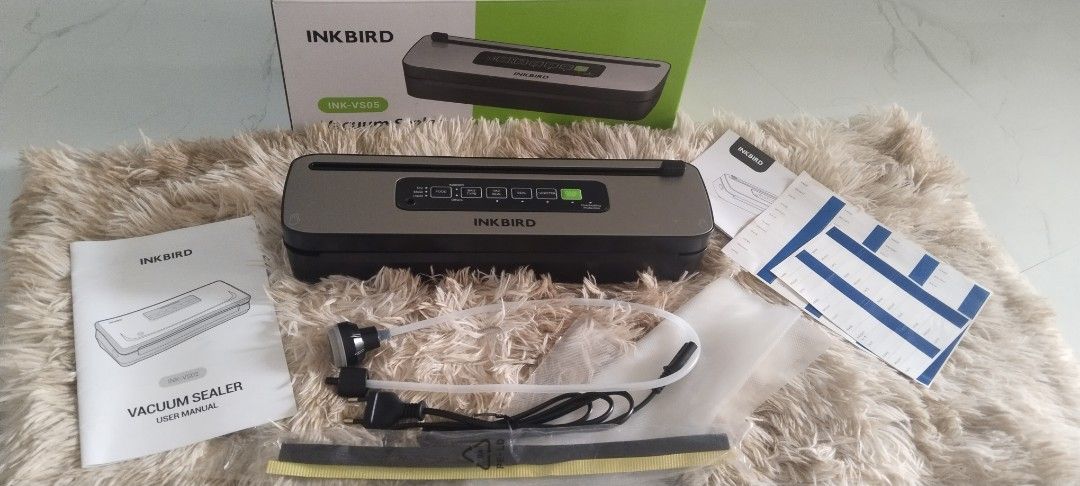 INKBIRD INK-VS05 Vacuum Sealer Machine (Category: Other Kitchen Appliances) located in Santa Maria. Submitted by fhinx (Listing ID 1460311792, Image 3). Description: - INKBIRD Vacuum Sealer (Model: INK-VS05) - Keeps food fresh significantly longer - Perfect for meal prepping and storing leftovers - Features an easy-to-use control panel - Package includes: Vacuum sealer machine, user manual, accessory hose, and sealing bags - Includes power cord I