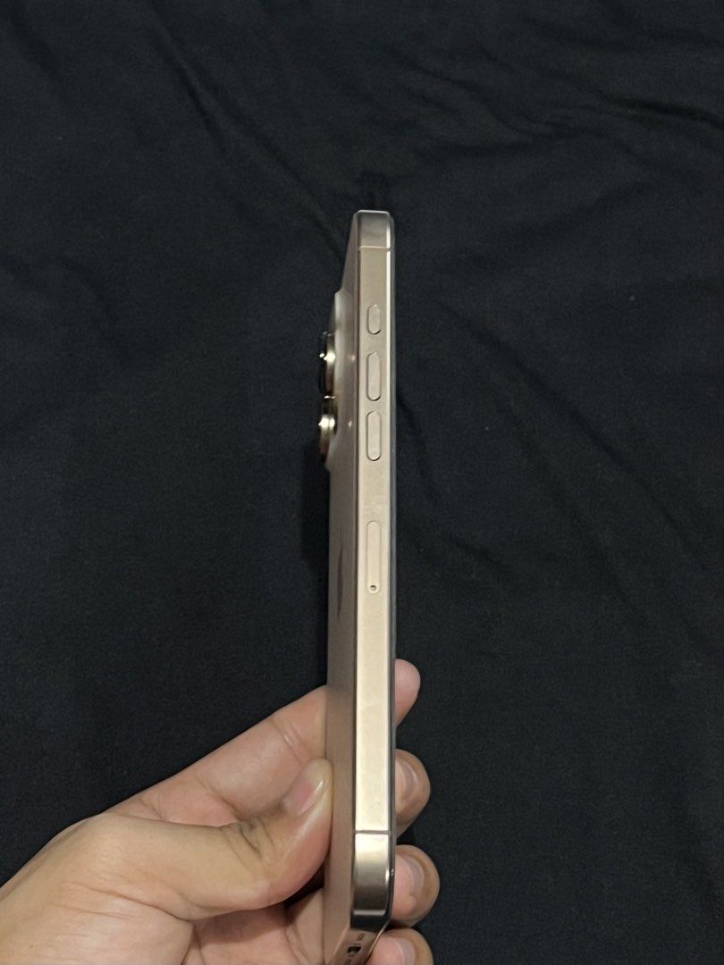 iPhone 16 Promax 256gb- Dessert Titanium (Category: iPhone 16 Series) located in Taguig. Submitted by rafaelelnar0701 (Listing ID 1460345324, Image 3). Description: Selling my iPhone 16 Pro Max 256GB in excellent condition. The unit is very clean, well-maintained, and rarely used. Unit Details: - iPhone 16 Pro Max — 256GB - 95% Battery Health as of posting - Very clean and well-maintained - Rarely used - No repair history / never repaired - All o