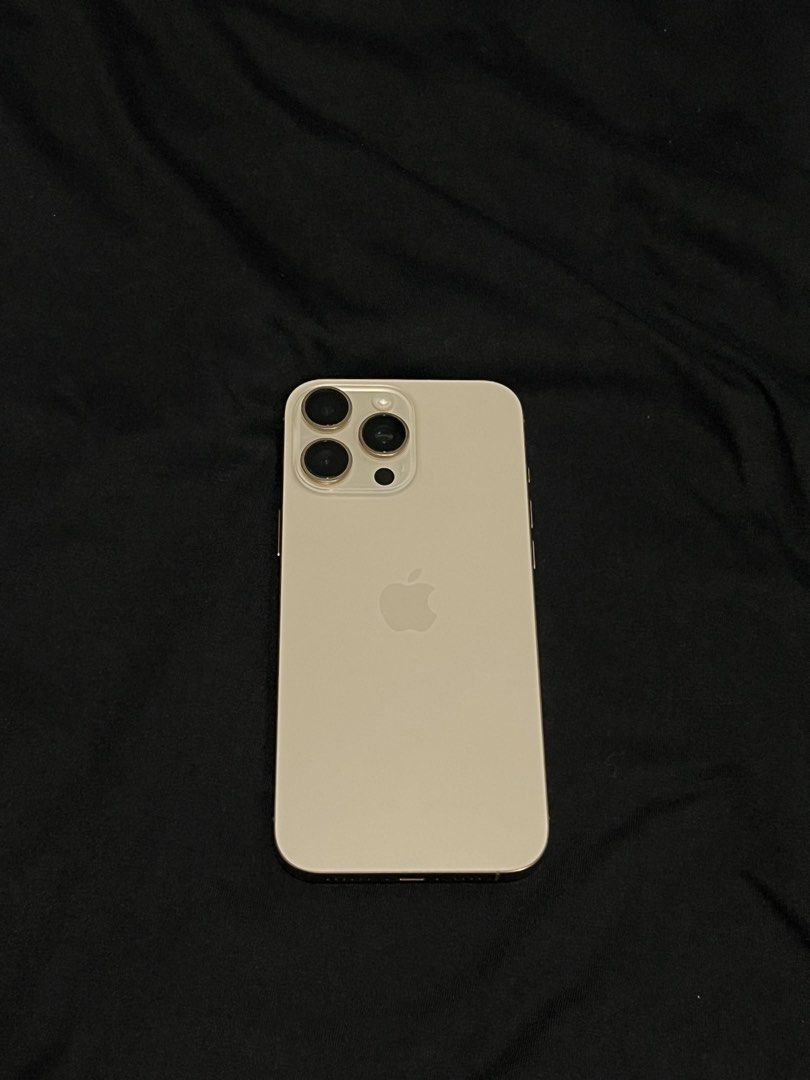 iPhone 16 Promax 256gb- Dessert Titanium (Category: iPhone 16 Series) located in Taguig. Submitted by rafaelelnar0701 (Listing ID 1460345324, Image 2). Description: Selling my iPhone 16 Pro Max 256GB in excellent condition. The unit is very clean, well-maintained, and rarely used. Unit Details: - iPhone 16 Pro Max — 256GB - 95% Battery Health as of posting - Very clean and well-maintained - Rarely used - No repair history / never repaired - All o