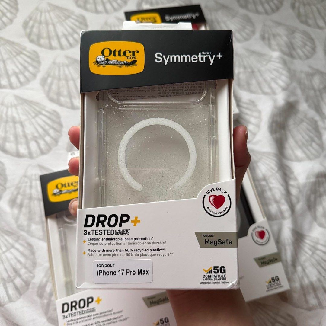 iPhone 17 Pro Max OTTERBOX SYMMETRY CLEAR MAGSAFE CASE (Category: Cases & Sleeves) located in Quezon City. Submitted by rcstny (Listing ID 1460351695, Image 3). Description: iPhone 17 Pro Max OTTERBOX SYMMETRY CLEAR MAGSAFE CASE - Premium Copy - 3x drop tested to military standard - wireless charging compatible - colors: black, clear, glitter-clear & glitter-pink ₱750.