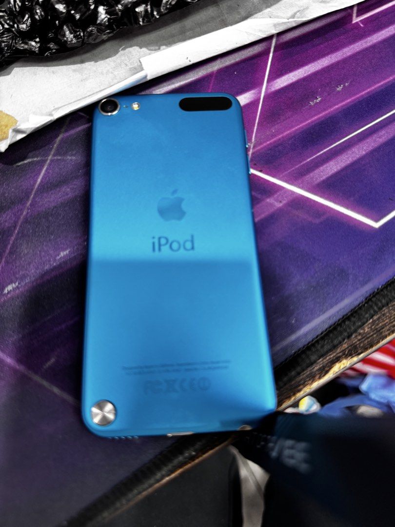 Ipod touch 5 (Category: Other Gadgets) located in San Juan City. Submitted by deanfranco52 (Listing ID 1460431133, Image 2). Description: Storage:32gb Color:blue Good condition Inclussion:charger.