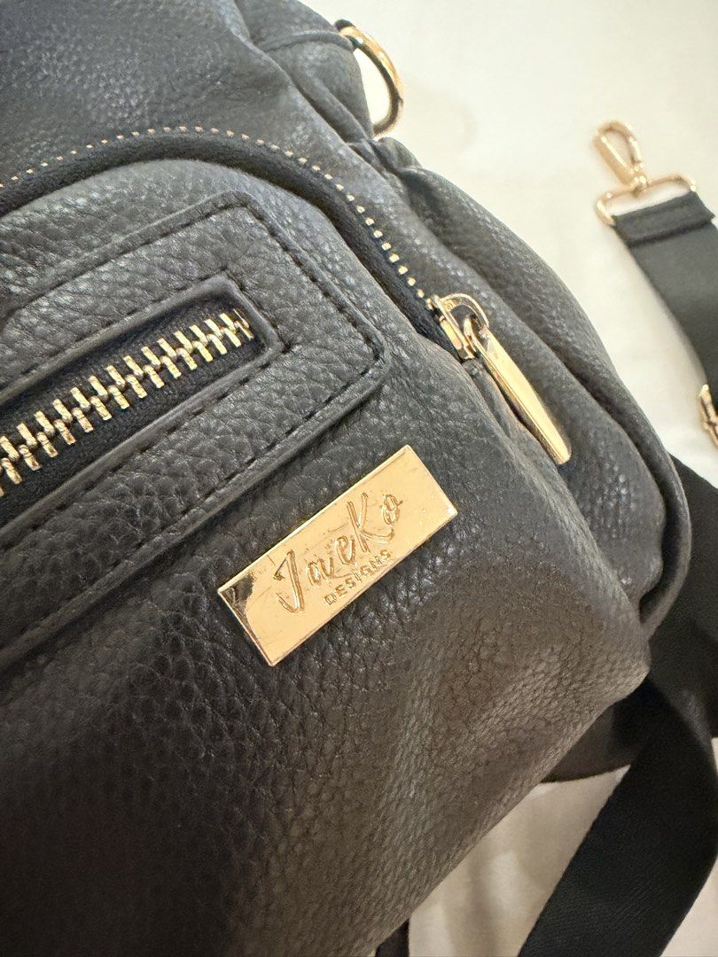 Jae Ko Mini Diaper Bag (Category: Diaper Bags & Wetbags) located in Bulacan. Submitted by roxanneio (Listing ID 1460411564, Image 3). Description: Slight scuffing under the bag. In good condition..