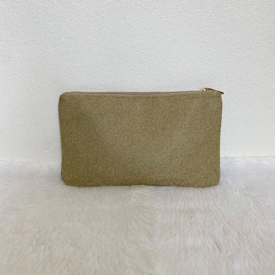 Japan Gold Glitter Zip Closure Flat Pouch Clutch (Category: Purses & Pouches) located in Cebu City. Submitted by posh_avenue888 (Listing ID 1460465160, Image 2). Description: In very good condition. From Japan. Crafted in nylon. 11" x 6.75"..
