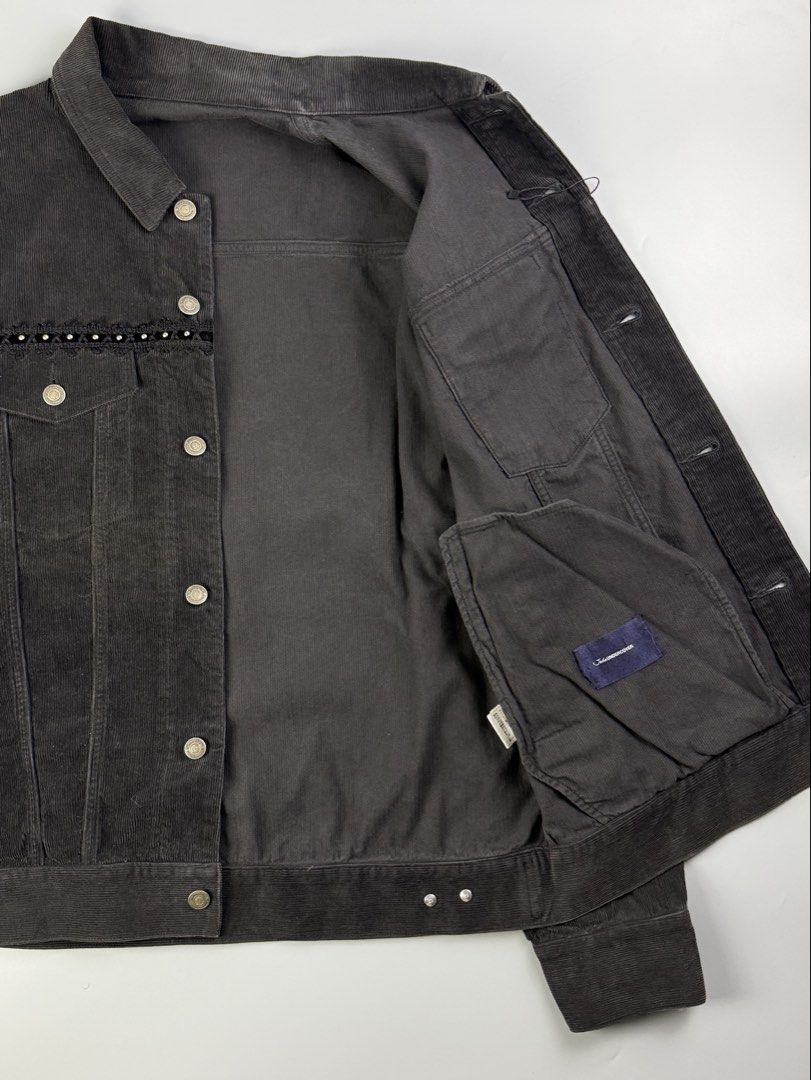 JohnUndercover - A/W18 - Studded Corduroy Jacket (Category: Coats, Jackets and Outerwear) located in Pasig City. Submitted by on_the_trend (Listing ID 1460493392, Image 2). Description: Tagged size: 4 Condition: 8/10 Flaws: Archive piece with natural aging. Features a beautiful minor overall fade across the cotton corduroy fabric. There is a visible sun-faded / oxidized reddish tint on the front panels by the buttons, which adds a distinct vintag