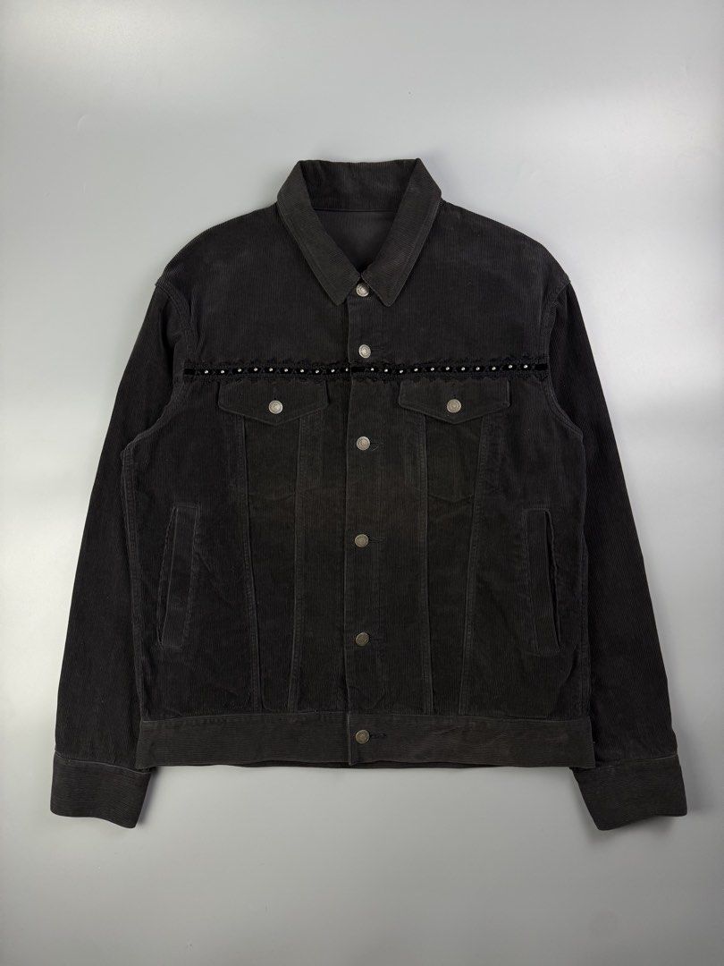 JohnUndercover - A/W18 - Studded Corduroy Jacket (Category: Coats, Jackets and Outerwear) located in Pasig City. Submitted by on_the_trend (Listing ID 1460493392, Image 1). Description: Tagged size: 4 Condition: 8/10 Flaws: Archive piece with natural aging. Features a beautiful minor overall fade across the cotton corduroy fabric. There is a visible sun-faded / oxidized reddish tint on the front panels by the buttons, which adds a distinct vintag