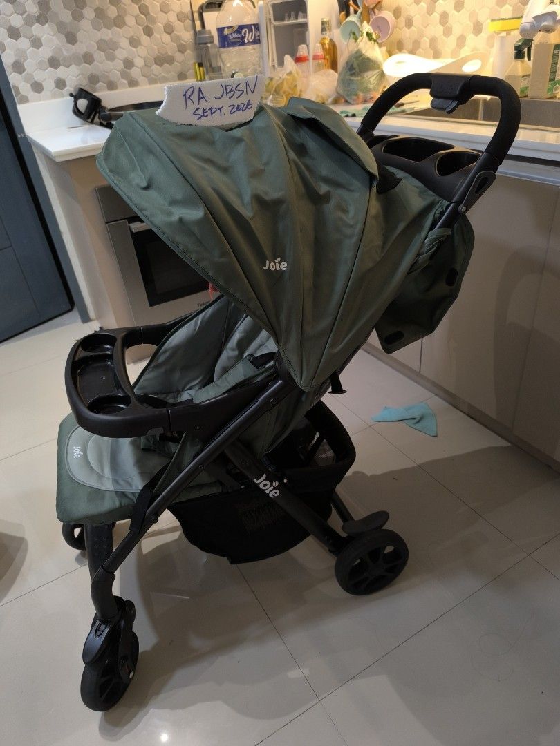Joie Stroller - Green (Category: Strollers) located in Caloocan City. Submitted by silentdeer.956993 (Listing ID 1460464811, Image 2). Description: - Green Joie stroller - Includes tray with cup holders - 5-point safety harness for secure seating - Adjustable canopy for sun protection - Folds easily for convenient storage - Smooth maneuverability for effortless strolling - Ideal for everyday outings Free deliver if near lang sa SM North to Visaya