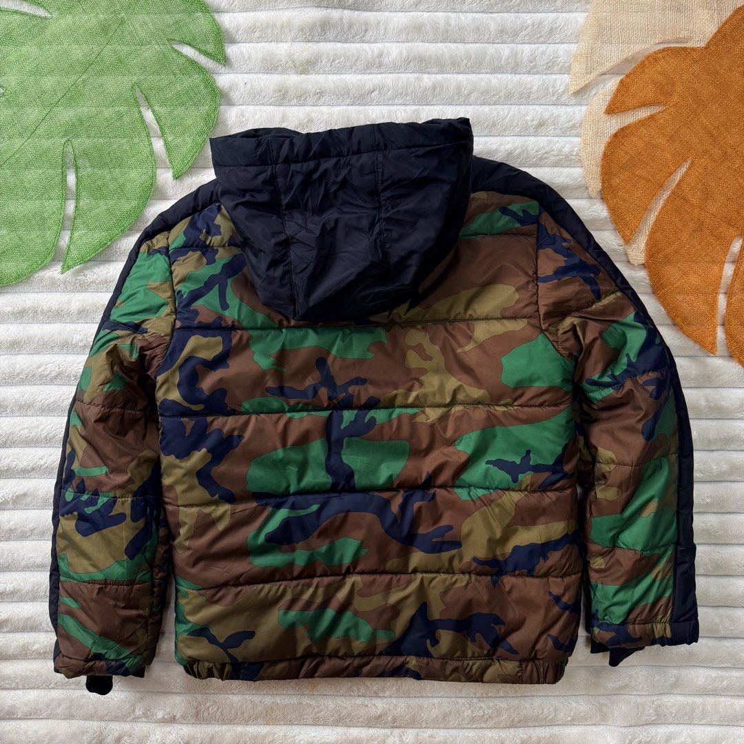 Jordan camouflage puffer jacket (Category: Babies & Kids Fashion) located in La Trinidad. Submitted by true_kidsclothing (Listing ID 1460491757, Image 2). Description: Jordan camouflage puffer jacket Size: 10-12 yrs old / keri XS-S petit wmns Very good to Excellent Used Condition -small scratch sa sleeves and small cut sa luob, check Comment box ₱950 Legit / Authentic .