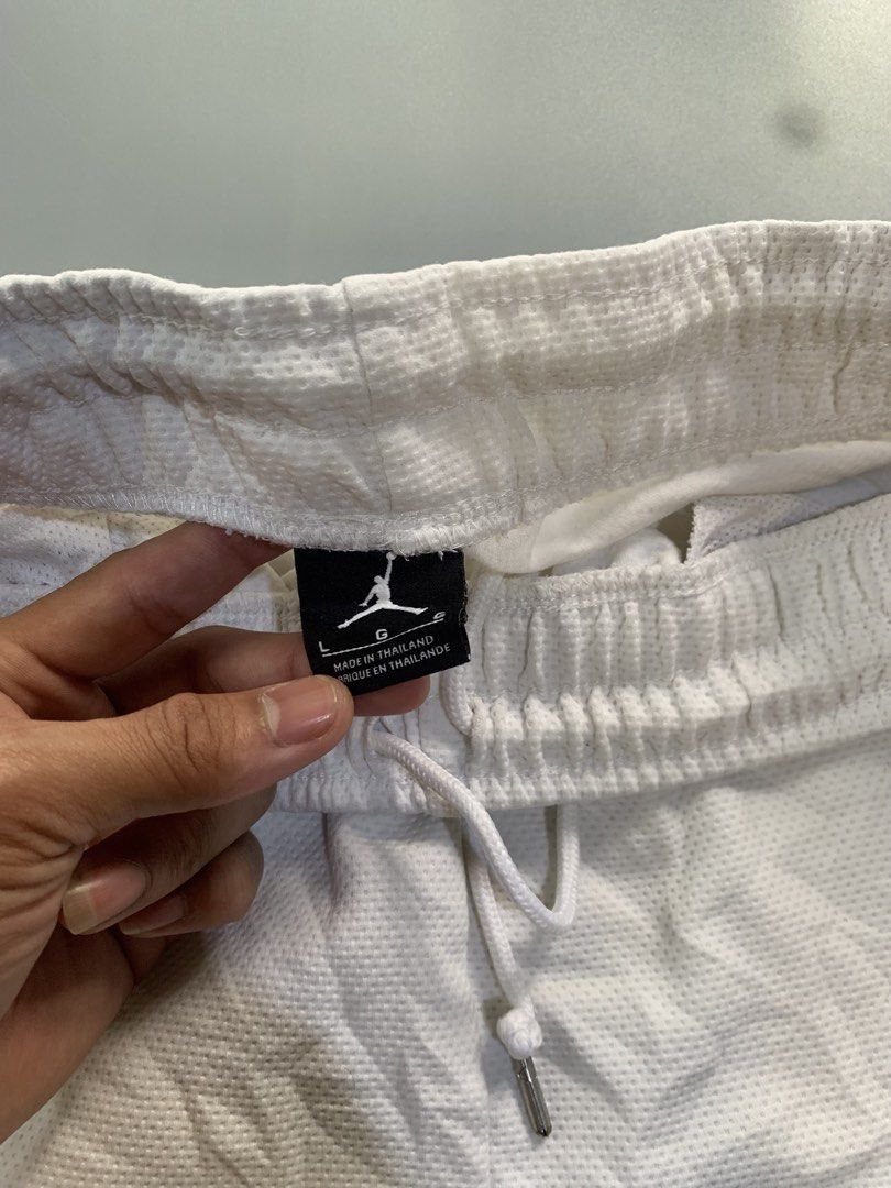 Jordan Shorts White Red Black Size L (Category: Shorts) located in Manila. Submitted by safefire_e3a28b (Listing ID 1460314912, Image 3). Description: - White Jordan shorts - Red and black accents - Elastic waistband with drawstring - Jordan logo on right leg - Made in Thailand - Size L - Minor faint marks on lower left leg (please check photos).