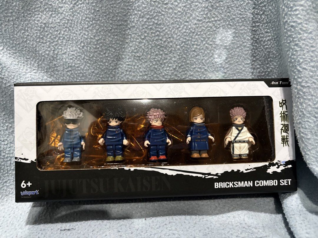 Jujutsu Kaisen Bricksman Combo Set Figures (Category: Figurines & Statues) located in Quezon City. Submitted by lai.espina (Listing ID 1460461341, Image 1). Description: - Jujutsu Kaisen Bricksman Combo Set - Includes 5 sealed figures: Satoru Gojo, Nobara Kugisaki, Megumi Fushiguro, Yuji Itadori, and Ryomen Sukuna - Ideal for fans of the anime - All figures are in sealed packaging - Box shows minor shelf wear.