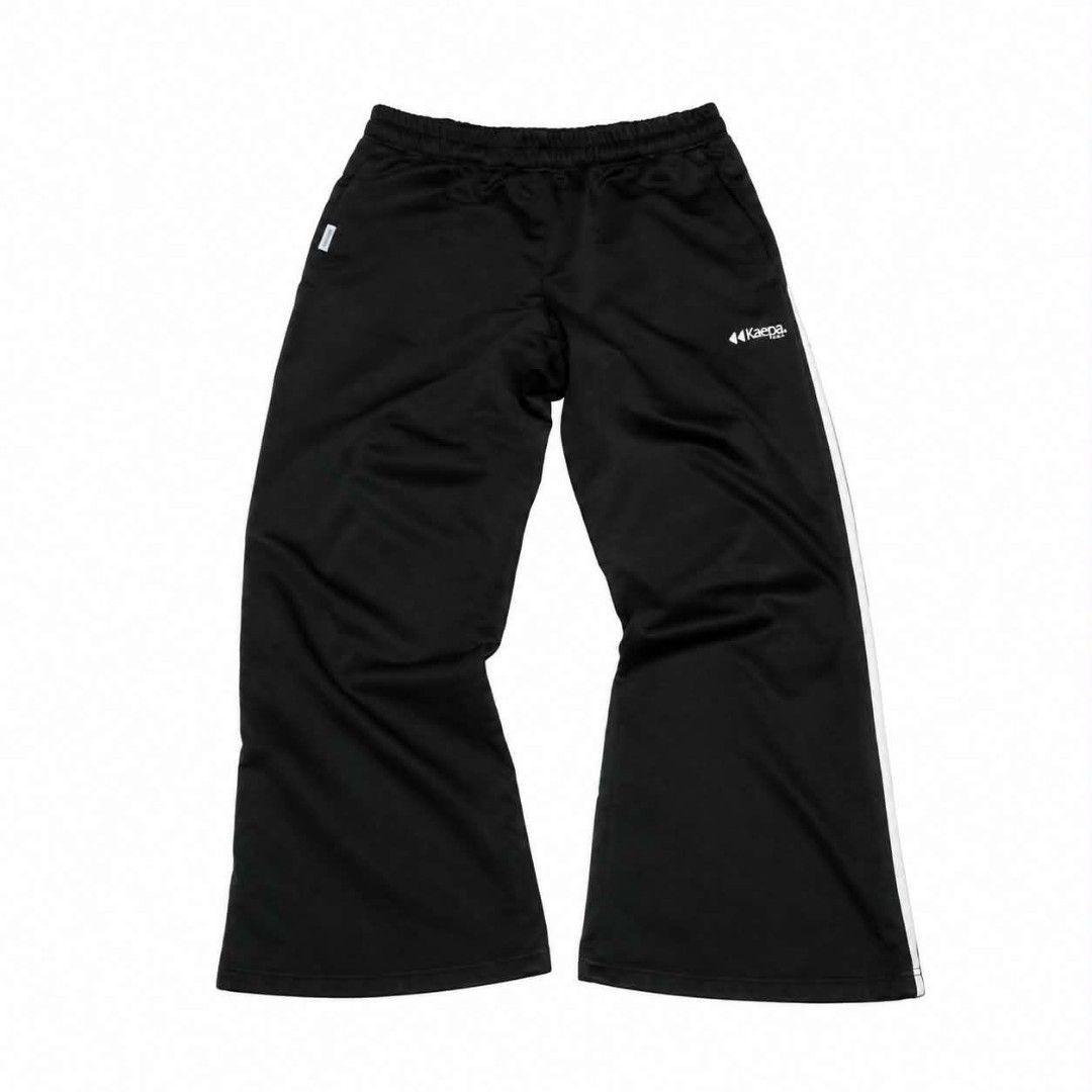 Kaepa Black Track Pants with White Stripe (Category: Joggers) located in Manila. Submitted by chieezz (Listing ID 1460456792, Image 1). Description: - Brand: Kaepa - Color: Black - Feature: White stripe down each leg - Waistband: Elastic for comfort - Leg opening: Wide - Ideal for: Casual wear or sports.