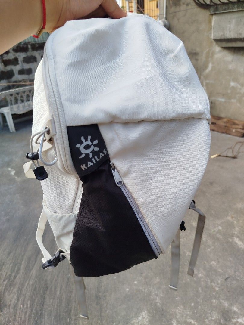 KAILAS 22L Backpack Cream White Black (Category: Backpacks) located in Bulacan. Submitted by kickstreetph (Listing ID 1460354193, Image 1). Description: Kailas Ridge 22 Hiking / Travel backpack Used goodcondition Sign of usage | Need wash with hydration bladder sleeves Minor stitch sa backpanel not visible when worn. dm me.