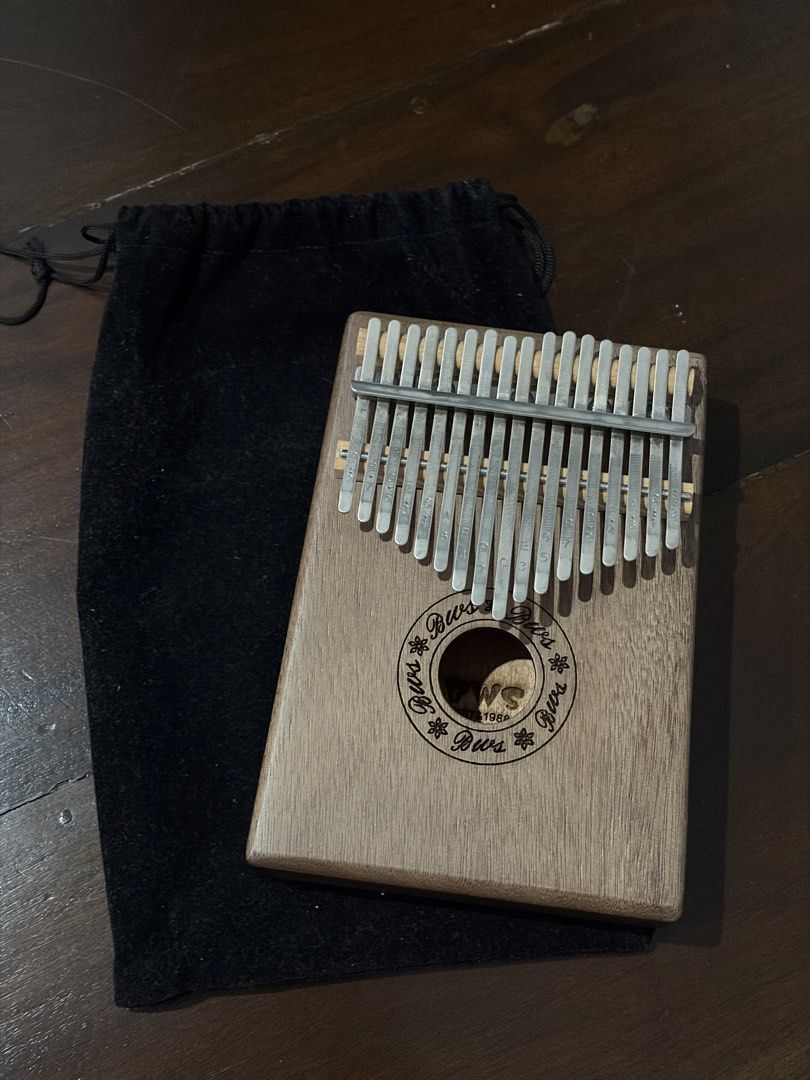 Kalimba (Category: Musical Instruments) located in Quezon City. Submitted by billiesjeans (Listing ID 1460443733, Image 3). Description: preloved but well-maintained! great for beginners or people looking for a new hobby comes with a velvet dust bag/pouch MOP: GCash, Maya, BPI shipping fee to be shouldered by buyer .