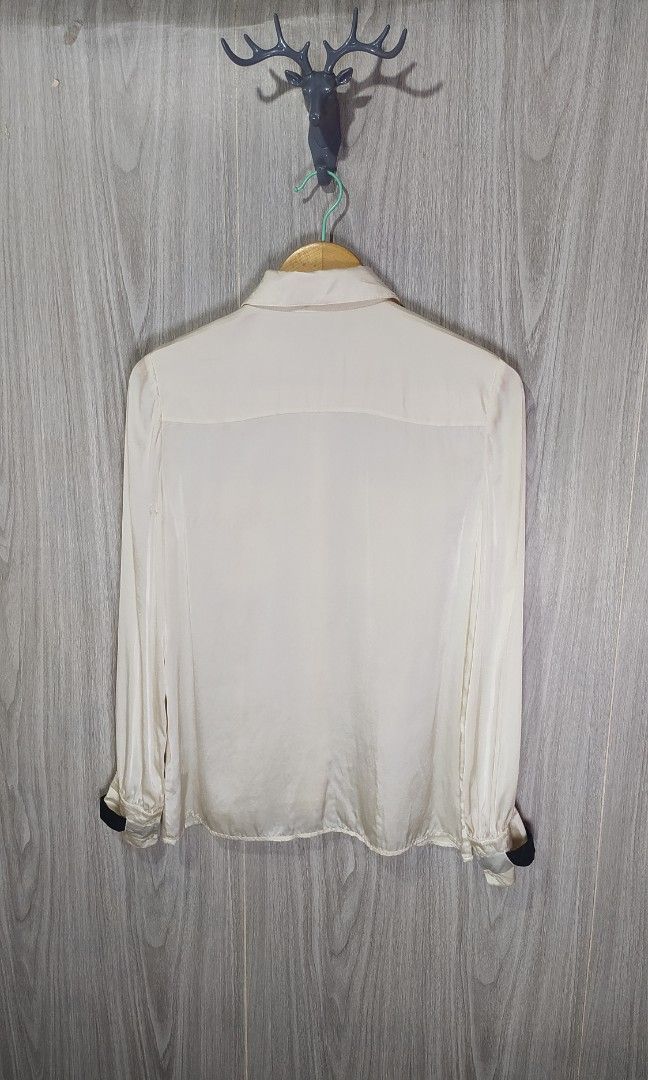 Karl Lagerfeld Button Down Blouse (Category: Blouses) located in Naga. Submitted by secondspinv2 (Listing ID 1460506678, Image 2). Description: Chanel Uniform Embroidered Logo ✅Size: S ✅Width: 18 ✅Length: 23 ✅Color Rate: 9.5/10 ✅No Issue ✅Need Wash ✅Location: Bicol Naga City, Camarines Sur ✅Courier: J&T Express/Flash Express ✅MOP: Gcash only.