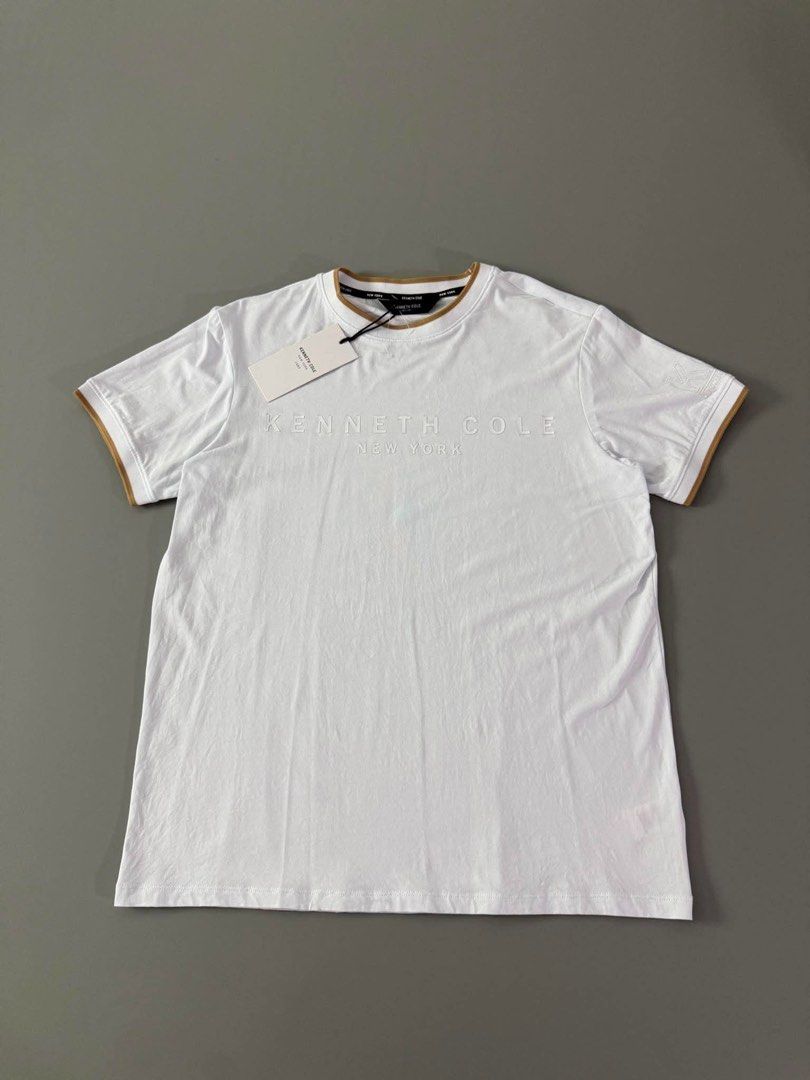 KENNETH COLE (Category: Tshirts & Polo Shirts ) located in Guagua. Submitted by sweetboyy (Listing ID 1460394339, Image 1). Description: KENNETH COLE EXCELLENT CONDITION / NO ISSUE SIZE MEDIUM ON TAG / DIMES L26.5 W21.