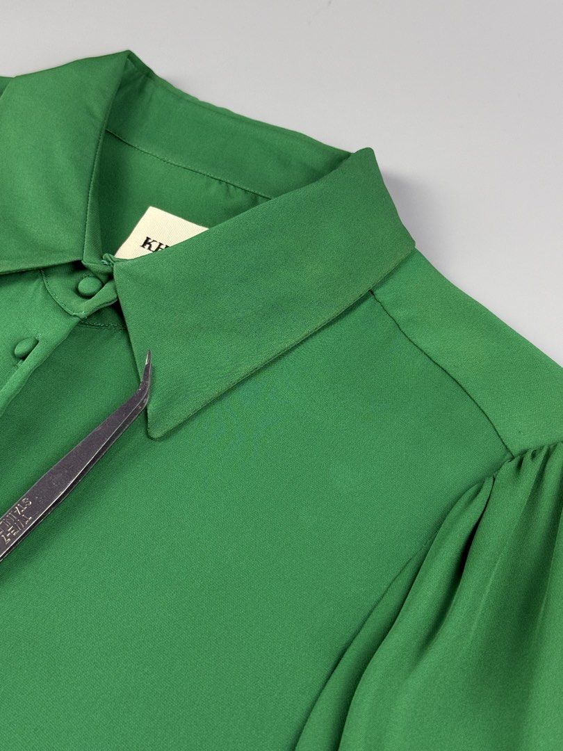 Khaite - Silk Long Sleeve Blouse (Category: Blouses) located in Pasig City. Submitted by on_the_trend (Listing ID 1460482945, Image 2). Description: Tagged size: Condition: 8/10 Flaws: Minor fadings on collar, Light marks, Minor stains, Tailor’s chalk on lining, Cut care tag/size tag Measurement: Width: 18 inches Shoulder: 15 inches Length: 20.5” (Back) / 23.5” (Front) Sleeve length: 23 inches.