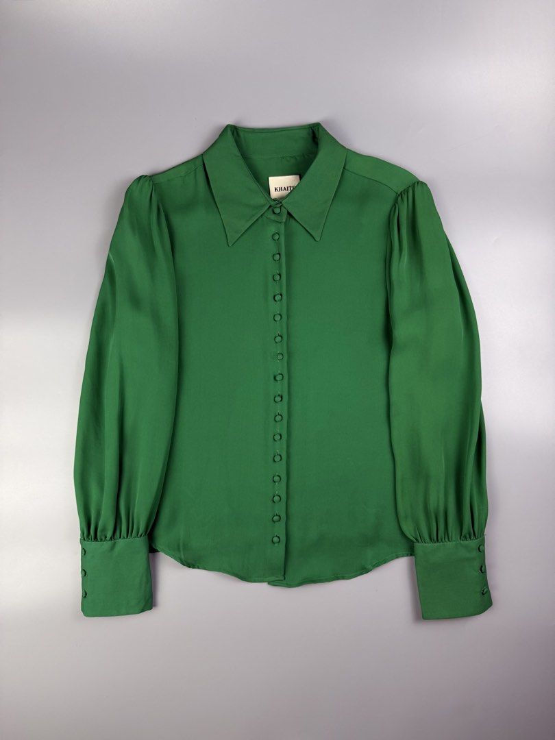 Khaite - Silk Long Sleeve Blouse (Category: Blouses) located in Pasig City. Submitted by on_the_trend (Listing ID 1460482945, Image 1). Description: Tagged size: Condition: 8/10 Flaws: Minor fadings on collar, Light marks, Minor stains, Tailor’s chalk on lining, Cut care tag/size tag Measurement: Width: 18 inches Shoulder: 15 inches Length: 20.5” (Back) / 23.5” (Front) Sleeve length: 23 inches.