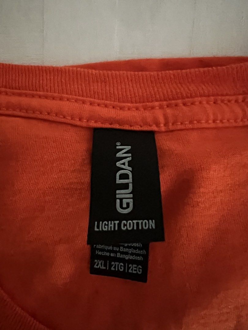 Knicks T-Shirt (Category: Activewear) located in Quezon City. Submitted by inthefrow (Listing ID 1460328676, Image 2). Description: - Brand new - No tags - Width is 25”, length is 32” - RFS: size too big - In 💯% Light Cotton - Be noticed in this bright orange color! • Best price already .