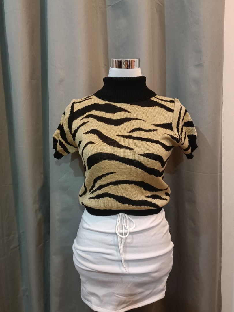 Knitted Shortsleeve Tiger Mock Turtle Neck Top (Category: Others Tops) located in Manila. Submitted by ebaest2025 (Listing ID 1460360625, Image 1). Description: .