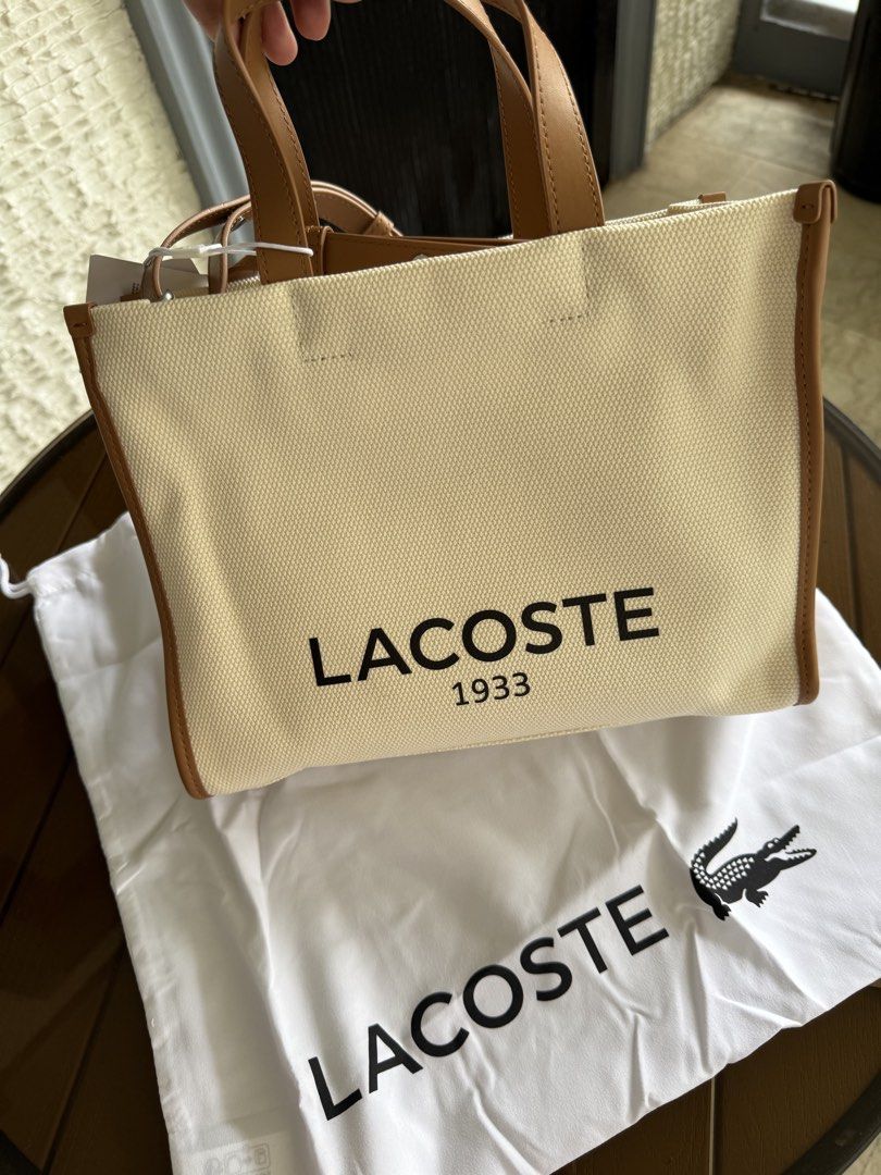 Lacoste Canvas Tote Bag in small size (Category: Tote Bags) located in San Leonardo. Submitted by iluvkopiii (Listing ID 1460331595, Image 1). Description: Brandnew and authentic lacoste heritage canvas tote bag. Complete with tag & plastic.