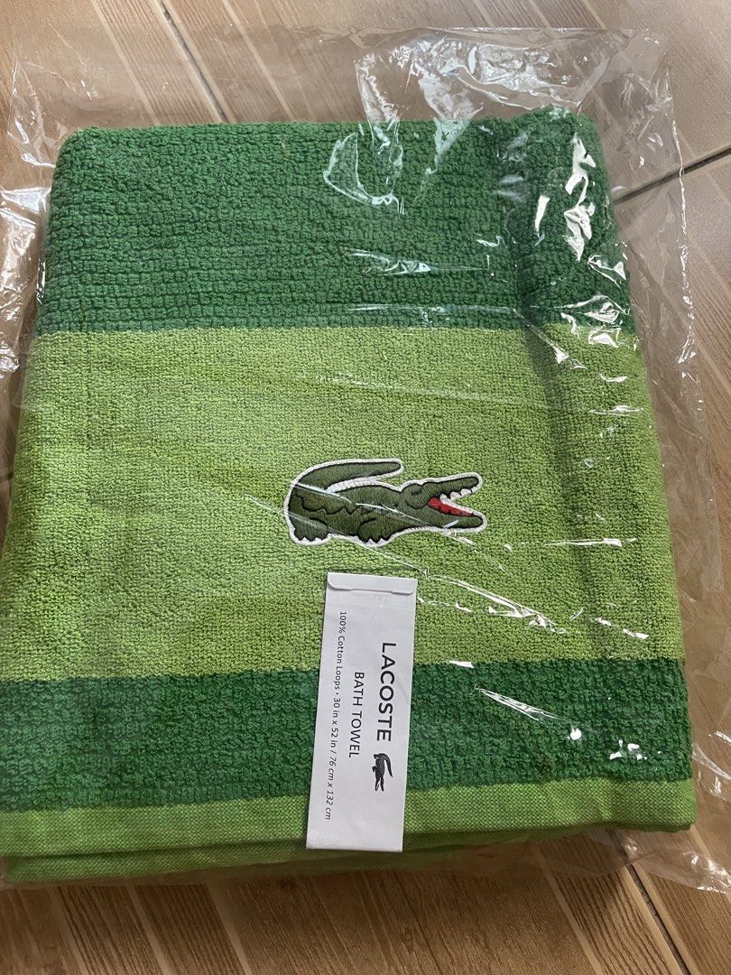 Lacoste Bath Towel Green Crocodile Logo (Category: Towels, Napkins & Holders) located in Paranaque City. Submitted by melvinmarquez (Listing ID 1460389533, Image 1). Description: Lacoste Bath Towel Green Crocodile Logo 100% Cotton Highly Absorbent - Authentic Green Lacoste Bath Towel - Features iconic crocodile logo - Made with 100% Cotton - Highly absorbent and low linting - Stylish two-shade green stripe design - Size: 30 inches x 52 inches (76