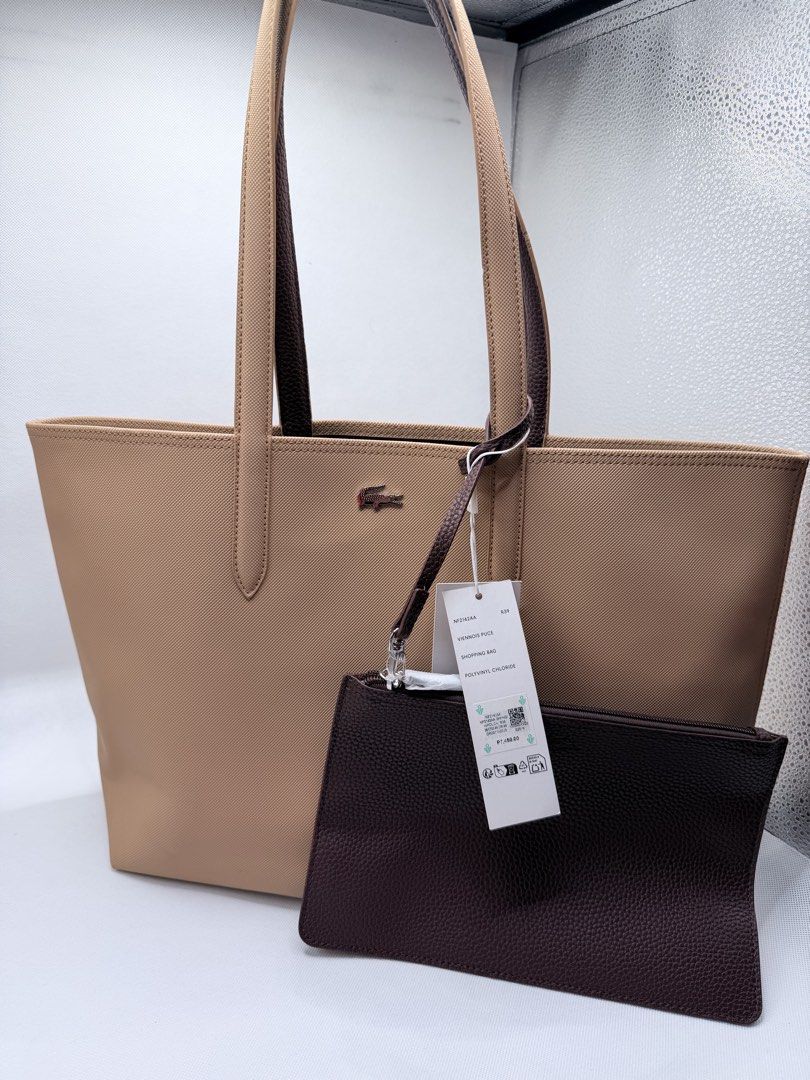 LACOSTE ORIG TOTE BAG(reversible) (Category: Shoulder Bags) located in Quezon City. Submitted by ajandstevenshopscorner (Listing ID 1460394861, Image 1). Description: May flaws pero di naman halata sa handle unused eto . Reversible Philcoa location.