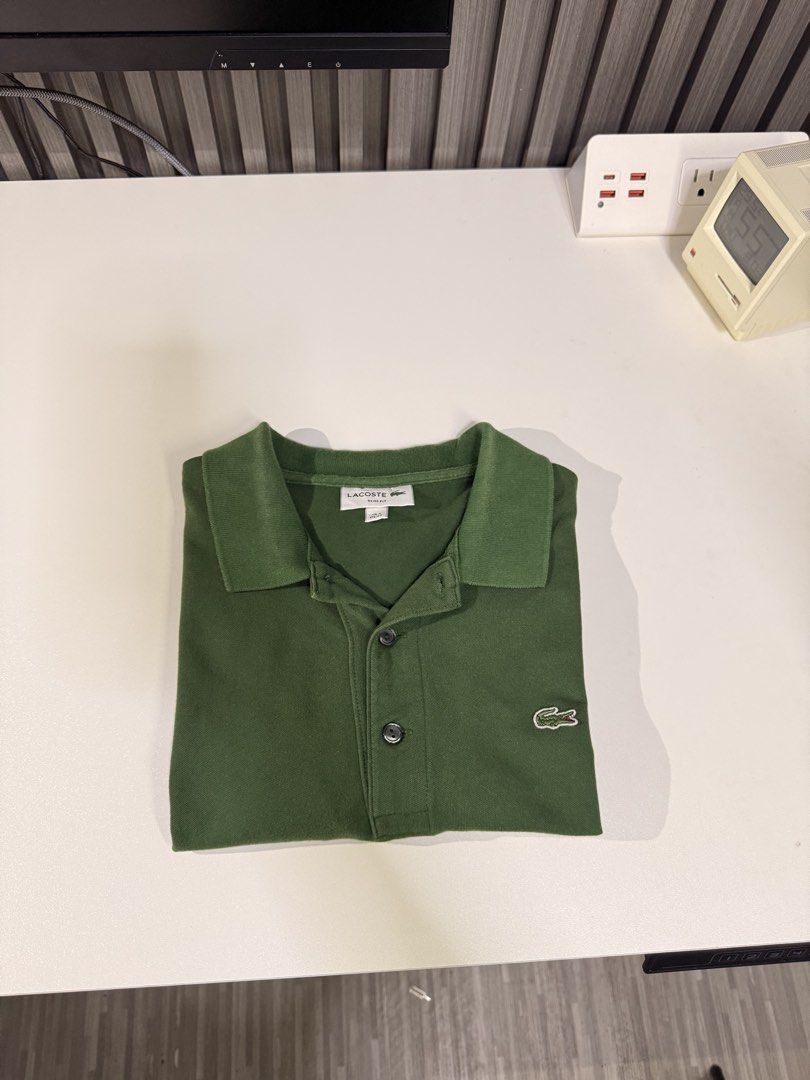 Lacoste Poloshirt (Category: Activewear) located in Bulacan. Submitted by jomar_0705 (Listing ID 1460308115, Image 1). Description: Lacoste Poloshirt XS on tag W19 L25 Good condition Sun fade Collar line.