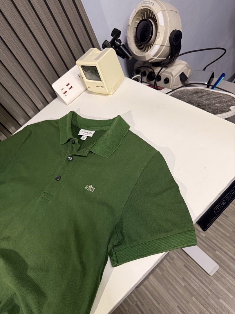 Lacoste Poloshirt (Category: Activewear) located in Bulacan. Submitted by jomar_0705 (Listing ID 1460308115, Image 3). Description: Lacoste Poloshirt XS on tag W19 L25 Good condition Sun fade Collar line.